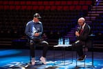 Trail Blazers owner and billionaire investor Tom Dundon, left, speaks with Portland Metro Chamber president and CEO Andrew Hoan during the annual Portland Metro Chamber meeting, amid discussions of renovating the Moda Center with public money, at the Moda Center in Portland, Ore., on June 24, 2026.