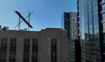 A large X logo on the roof of X, formerly Twitter, headquarters on July 31, 2023 in San Francisco. Musk has since announced that the company's headquarters are moving to Texas.