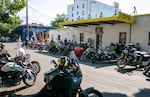 Motorcycles line Northeast 17th Avenue for the grand opening of One Moto Cafe, formerly known as See See Motor Coffee Co., on July 26, 2024, Portland, Ore. Attendee Corey Fox told OPB, "It used to be like this all the time. This is what you get when you have real people, not a corporation." 