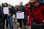 People attend the community rally on Friday, Nov. 28, 2025 in Beaverton, Ore., in response to the deportation of local resident Paulino Martin. Several attendees held signs demanding action from the Beaverton School District.