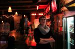 Jutta Brandon behind the bar at the Lion's Eye Tavern.