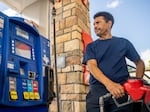 A customer pumps gas at an Exxon gas station in Houston, Texas, on July 29, 2022. U.S. oil companies are becoming a lot more restrained about production, and that could keep gas prices high over the longer term.