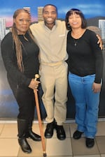 Bobby Everson with his aunt Angela Everson (left) and his sister Ebony during a 2018 visit at a federal prison in South Carolina.