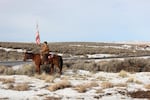 Duane Ehmer patrols the Malheur National Wildlife Refuge complex with his horse Hell Boy during the occupation of the refuge in early 2016.