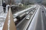 Traffic into the city slows with the dusting of snow.