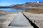 FILE - This Feb. 18, 2022, file photo shows low water levels on a reservoir near Summer Lake, Ore. The Oregon Water Resources Department is seeking public input for updating one of its guiding documents.
