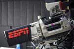 A television camera is viewed during an ESPN broadcast of a WNBA basketball game between the Connecticut Sun and the Minnesota Lynx on July 26, 2020, in Bradenton, Fla. ESPN is launching a new streaming service at $29.99 per month.