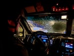 A photo released by the Clark County Sheriff's Office shows the damaged windshield of an armored police vehicle. Police say they shot and killed an armed suspect in Vancouver on Sept. 27, 2024 after the man fired a rifle at police.