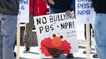 People participate in a rally to call on Congress to protect funding for US public broadcasters, PBS and NPR, outside the NPR headquarters in Washington, DC, on March 26, 2025.