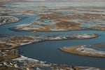 Some homes and buildings that were torn off their foundations and floated away are seen near the village of Kwigillingok, Alaska, Monday, Oct. 27, 2025, after Typhoon Halong hit the region earlier in the month.