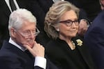 FILE - Former President Bill Clinton and former Secretary of State Hillary Clinton listen during the state funeral for former President Jimmy Carter at Washington National Cathedral in Washington, Jan. 9, 2025.