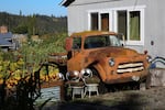 An old truck decorates the flower garden at Old Trunk Treats and Antiques, Odell, Ore., Oct. 6, 2025.