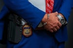 FILE - An Immigration and Customs Enforcement officer's badge is visible during an ICE hiring fair, Aug. 26, 2025, in Arlington, Texas.
