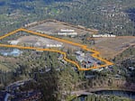 The Deschutes County board of commissioners has approved the sale of an old county landfill to Oregon State University-Cascades for $1. 
