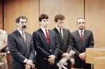 Lyle Menendez (second from left) and his brother, Erik are flanked by their attorneys Gerald Chaleff (left) and Robert Shapiro, in Beverly Hills Municipal Court in 1990.