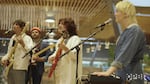 The Apricots, a Portland-based band, performs at the Portland International Airport on Nov. 14, 2024.