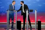 Andrew Cuomo, New York City mayoral candidate, left, and Zohran Mamdani, New York City mayoral candidate, shake hands during a mayoral debate in New York Thursday, Oct. 16, 2025.