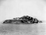 This image shows Alcatraz Island when it was a military prison, circa 1900.