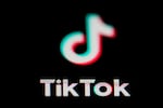 FILE - The icon for the video sharing TikTok app is seen on a smartphone, on Feb. 28, 2023. Oregon lawmakers are considering banning the app on state-owned devices.