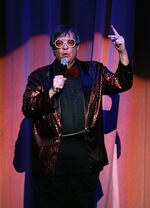 Sal Piro, longtime president of the ‘Rocky Horror Picture Show’ fan club, speaks during a 35th anniversary screening at the Wiltern on Oct. 28, 2010, in Los Angeles. A former seminarian and aspiring comedian, Piro saw his first screening in 1976 and led the fan club until his death in 2023.