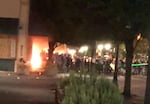 The Portland Police Bureau accused protesters of attempting to set the bureau's north precinct building on fire. Multiple online accounts of the evening tell a different version of events overnight from Thursday into pre-dawn Friday morning.