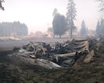 An Oregon Department of Fish and Wildlife hatchery building was destroyed by the Two Four Two Fire near Klamath Agency, north of Klamath Lake. Fish in tanks near the building seemed unharmed.