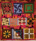 A completed Underground Railroad Code quilt made by Edith Edmunds. The top right block represents the "monkey wrench," which is believed to have been a message to would-be enslaved escapees to get prepared to run.