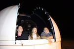 Onalaska High School science teacher Johnny Garcia hosts a stargazing event with two of his Centralia College students Shauna Ritter (left) and Hunter Hahn (right).