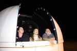 Onalaska High School science teacher Johnny Garcia hosts a stargazing event with two of his Centralia College students Shauna Ritter (left) and Hunter Hahn (right).