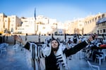 An Orthodox Jew prays at the Western Wall in Jerusalem's Old City on March 25. Above the Western Wall is the compound revered by Muslims as the Noble Sanctuary and by Jews as the Temple Mount.