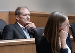 Thornburgh developer Kameron DeLashmutt listens to testimony about the capacity of the Deschutes Basin aquifer while seated behind his water law attorney, Elizabeth Howard, in Deschutes County Circuit Court on Nov. 7, 2024.