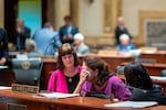 Kentucky state Sen. Karen Berg (D-Louisville), is consoled by colleagues after SB 150 passed the Senate, 29-6, at the Kentucky state Capitol in Frankfort on Feb. 16, 2023. Berg's transgender son died by suicide in December 2022.