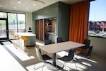 Kitchen and dining table on the second floor of the crisis center. Natural light contributes to a calming environment, in Corvallis, Ore., on July 15, 2025.