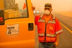 Oregon Department of Transportation maintenance specialist Del Sabrowski closes part of a highway in response to the 2020 Labor Day wildfires.