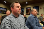 Joey Shearer, left, project manager of the Caldera Ranch project, listens as the Bend City Council approves their application for one-time UGB expansion at council meeting on Dec. 4, 2024.