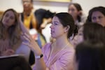 Kate Speer speaking at a summit for mental health influencers held at the Harvard T.H. Chan School of Public Health in August.