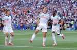 Charles De Ketelaere #17 of Belgium celebrates after scoring his team's second goal during the World Cup Round of 16 match against the United States on Monday in Seattle.