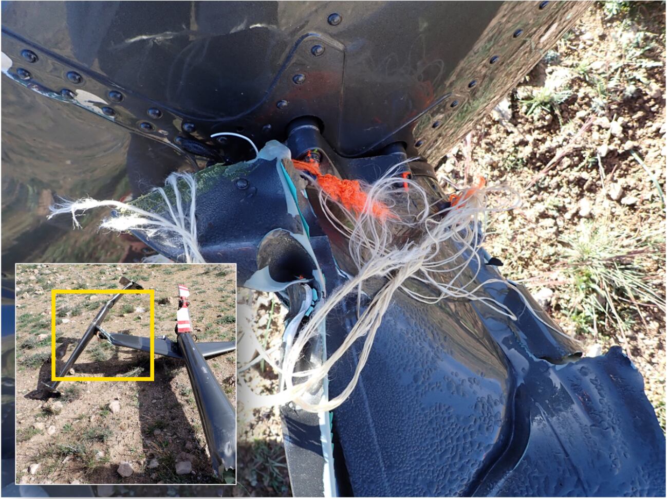 Pieces of the slackline webbing wrapped around pieces of the wrecked helicopter.