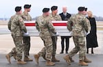 President Biden and first lady Jill Biden attend the dignified transfer of the remains of three U.S. service members killed in a drone attack on a U.S. military outpost in Jordan, at Dover Air Force Base in Delaware on Friday.