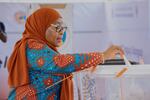 Tanzanian President Samia Suluhu Hassan casts her vote at a polling station in Dodoma, Tanzania, on Wednesday.