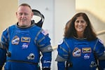 NASA astronauts Butch Wilmore (left) and Suni Williams, wearing Boeing spacesuits, who flew to the International Space Station aboard Boeing's Starliner capsule, shown on June 5, 2024. The duo were expected to stay for just 10 days but due to problems with Starliner, they ended up staying on the stag