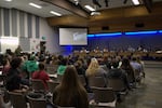 Families and workers fill a Eugene 4J School Board meeting on Dec. 10, 2025.