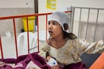A child wounded, according to Tasnim news agency, in a strike on a home where a wedding was being held in Kuhestak, southern Iran, receives treatment at a hospital in Menab, Iran, early Wednesday, Sept.2, 2026.