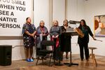 Members of the Portland All Nations Canoe Family share a song with a crowd gathered at the Center for Native Arts and Cultures for the “Citizen Fellow: Art as Archive and Memory” exhibition opening on Sept. 19, 2024.