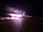 This image provided by the U.S. Navy shows an aircraft launching from USS Dwight D. Eisenhower (CVN 69) during flight operations in the Red Sea on Monday.