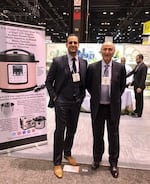 Bobby Djavaheri (left) and his father Yedidia sell air fryers and other appliances, mostly manufactured in China. Bobby worries that a 60% tariff on imports from China would push the retail price of his products over $200.