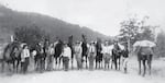 In this image provided by the Reece Family Archive, the "Hen Party" poses for a photo just before heading into the Wallowas Mountains. Jean Birnie, the group's leader, stands on the far right with a packhorse circa 1933.