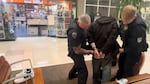 Police in Bellevue, Wash., arrest a man accused of stealing a pair of white Nike shoes. The cops were on a stakeout outside the local mall, texting back and forth with store security to identify and apprehend suspected thieves.