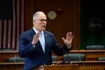 Washington Gov. Jay Inslee speaks during a legislative session preview in the Cherberg Building at the Capitol Thursday, Jan. 4, 2024 in Olympia, Wash. Inslee has ordered the state to figure out new rules for when it kills wolves that repeatedly attack livestock.