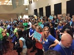 Portland teachers in blue T-shirts and ACCESS Academy parents in green packed the Portland Public Schools board meeting Oct. 24, 2017. 